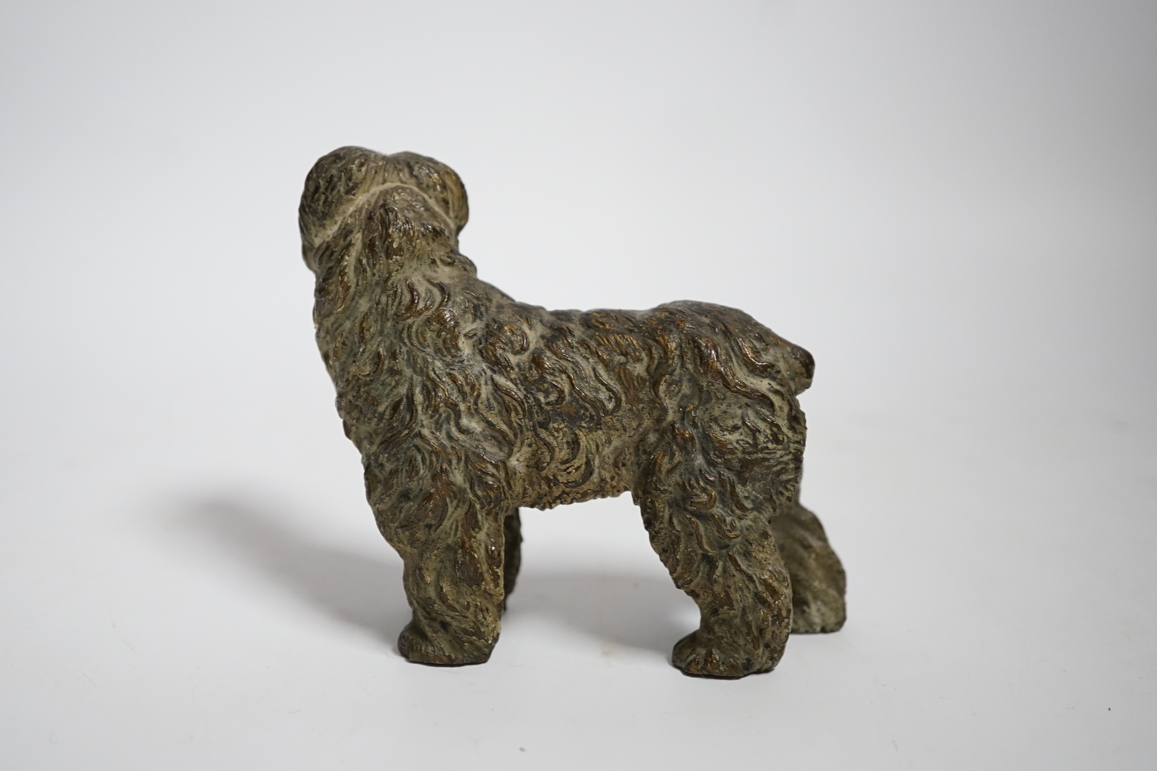 A cold painted bronze model of a dog, 11cm wide